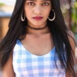 Young Woman in a Blue Checkered Tank Top