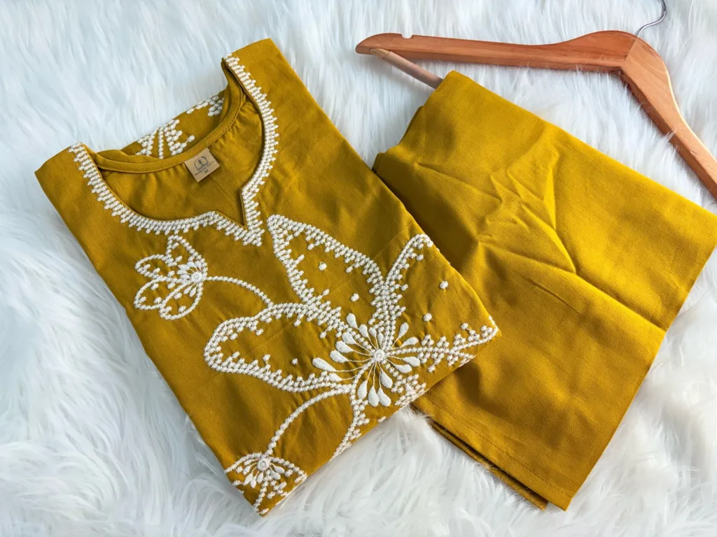 Mustard yellow cotton suit with white floral thread embroidery – soft and elegant ethnic wear perfect for daily or office use.
