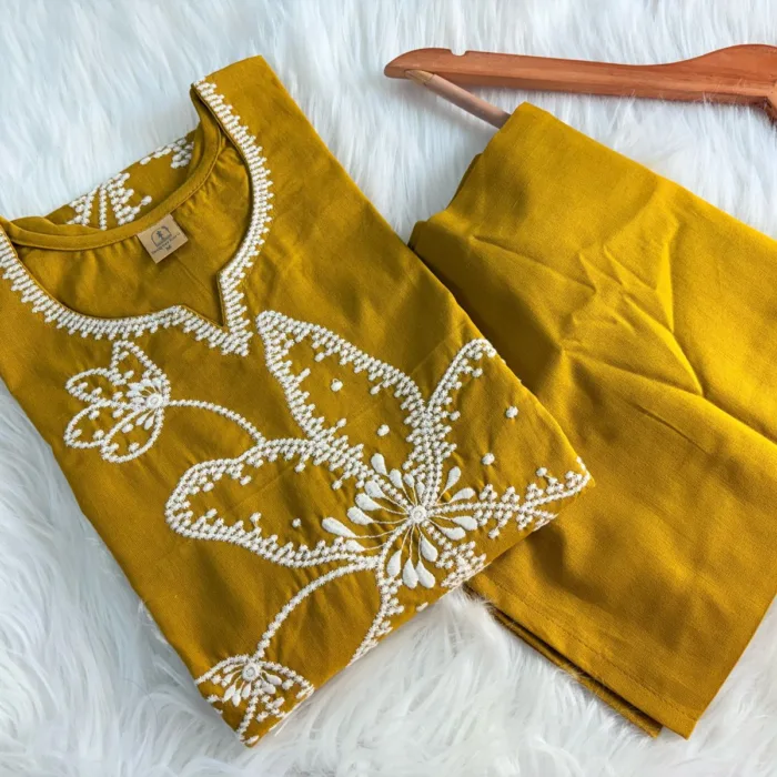 Mustard yellow cotton suit with white floral thread embroidery – soft and elegant ethnic wear perfect for daily or office use.