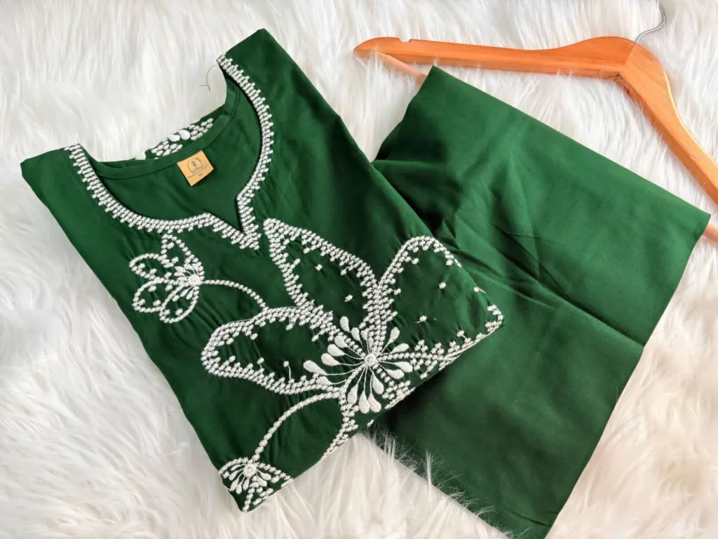 Green cotton suit with white floral thread embroidery – breathable and elegant daily wear ethnic outfit for women.