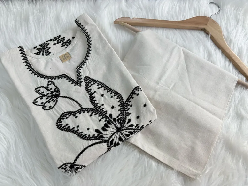 Cream cotton suit set with black floral thread embroidery – elegant daily wear ethnic outfit for women.
