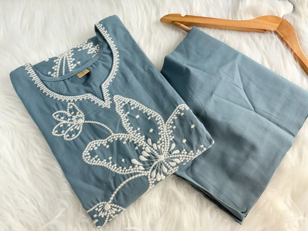 Dusty blue cotton suit with elegant white floral thread embroidery – breathable and beautiful ethnic wear for women.