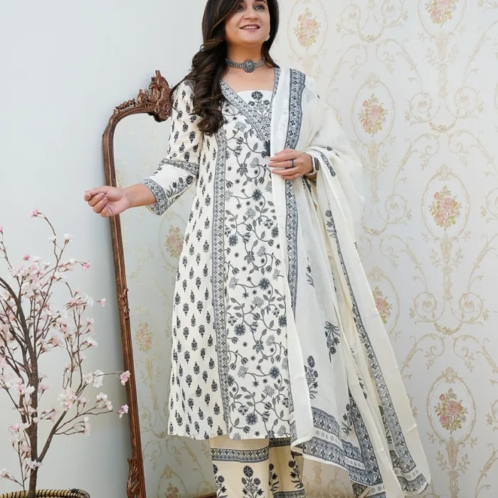 Grace meets comfort in this Off-White and Black Cotton Printed Suit Set with dupatta. A timeless choice for everyday elegance or festive styling.
