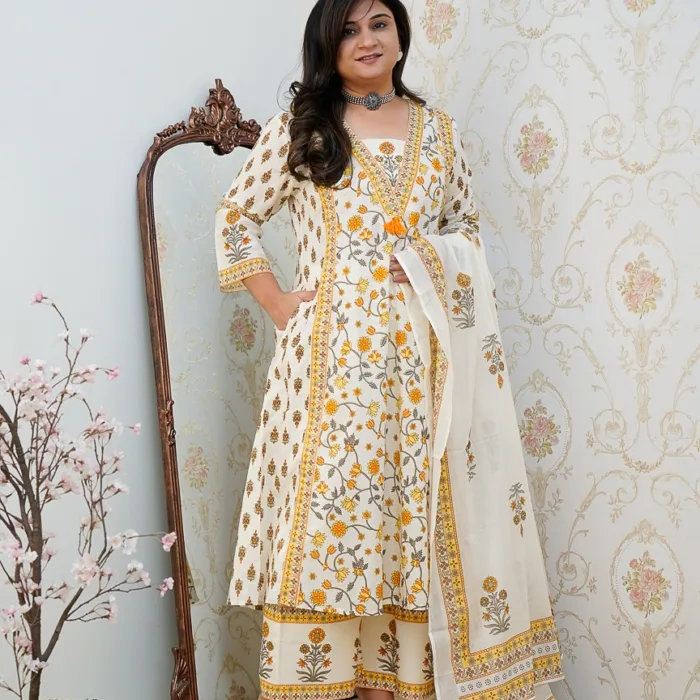 Grace meets comfort in this Off-White and Yellow Cotton Printed Suit Set with dupatta. A timeless choice for everyday elegance or festive styling.