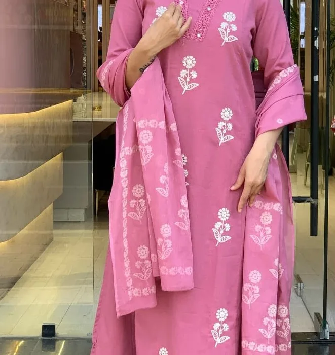 Add a touch of effortless grace to your ethnic wardrobe with this Pink Embroidered Cotton Suit Set . Featuring beautiful floral embroidery and a matching dupatta, it’s a perfect pick for small gatherings, festive occasions, or day functions.