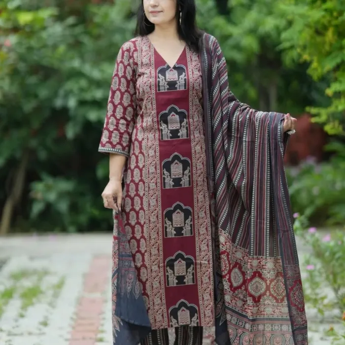Elevate your ethnic wardrobe with this stunning Black And Maroon Cotton Printed Suit Set. Adorned with heritage-style prints and paired with a rich printed dupatta, this look blends cultural richness with modern charm. Ideal for festive wear, office wear, or casual occasions.