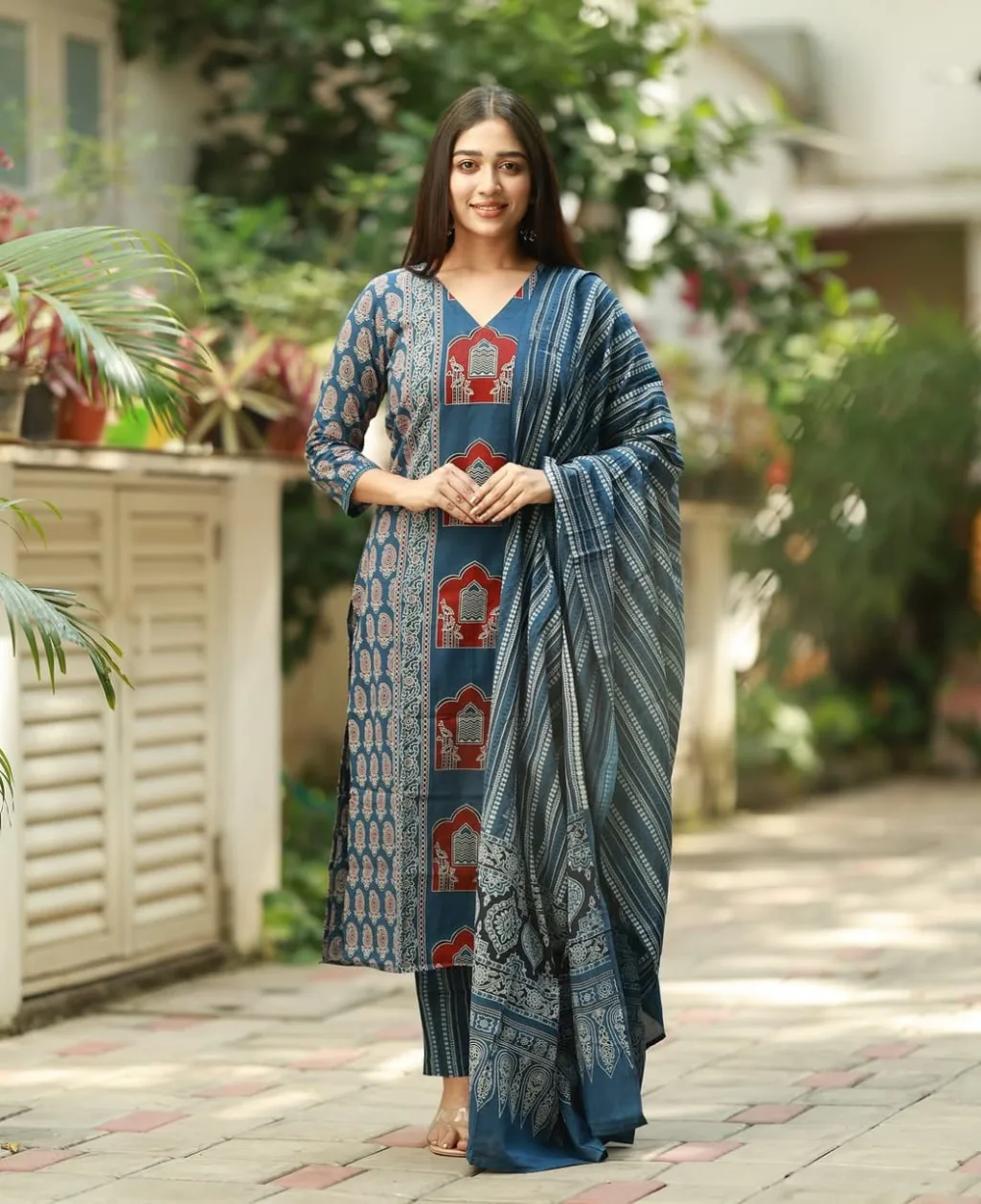 Elevate your ethnic wardrobe with this stunning Royal Blue And Maroon Cotton Printed Suit Set. Adorned with heritage-style prints and paired with a rich printed dupatta, this look blends cultural richness with modern charm. Ideal for festive wear, office wear, or casual occasions.